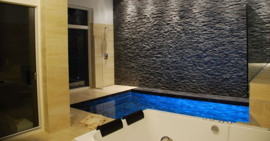 Swimming Pool with slate wall